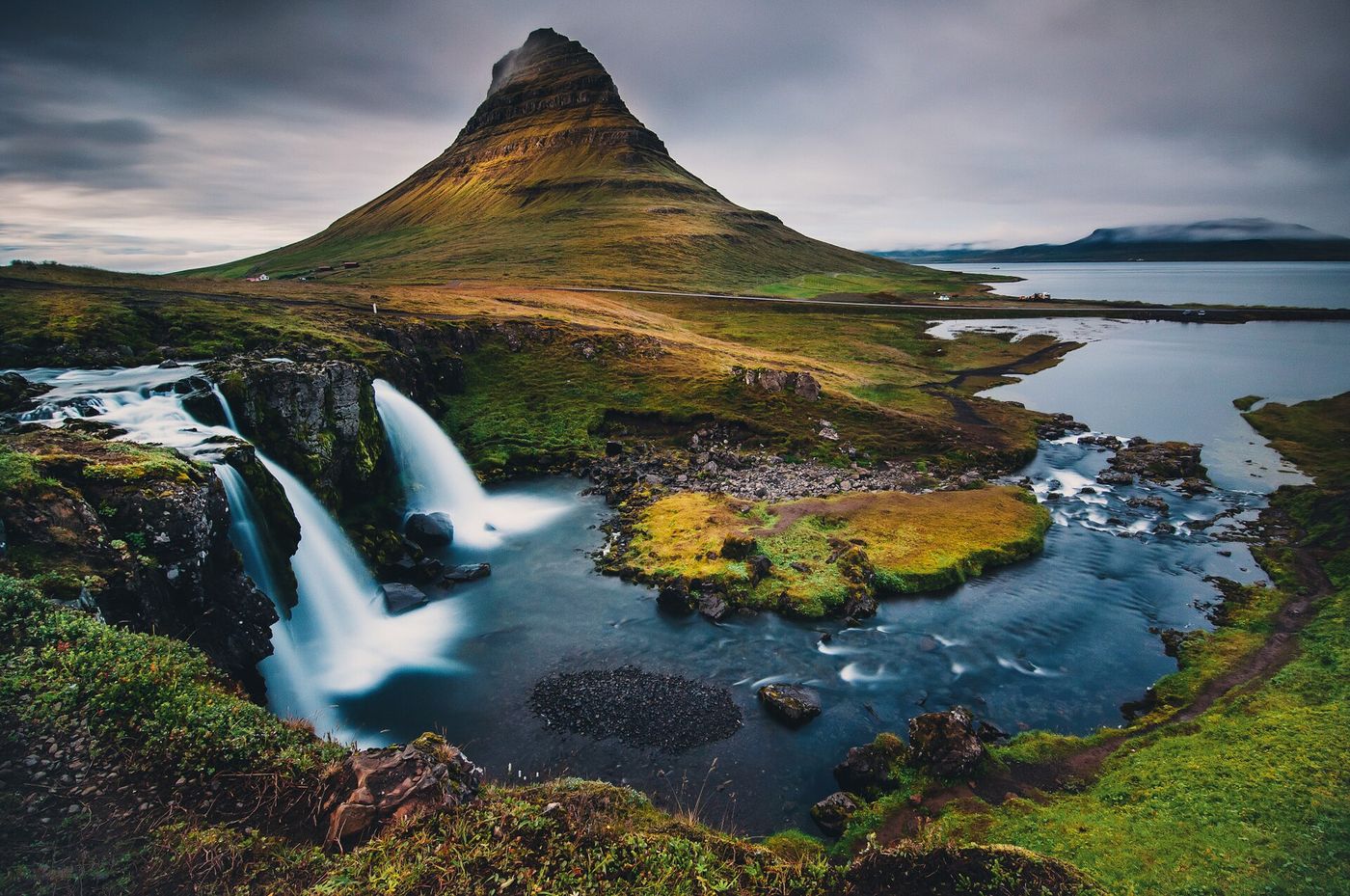 Kirkjufell mountain with Kirkjufellsfoss waterfall in front