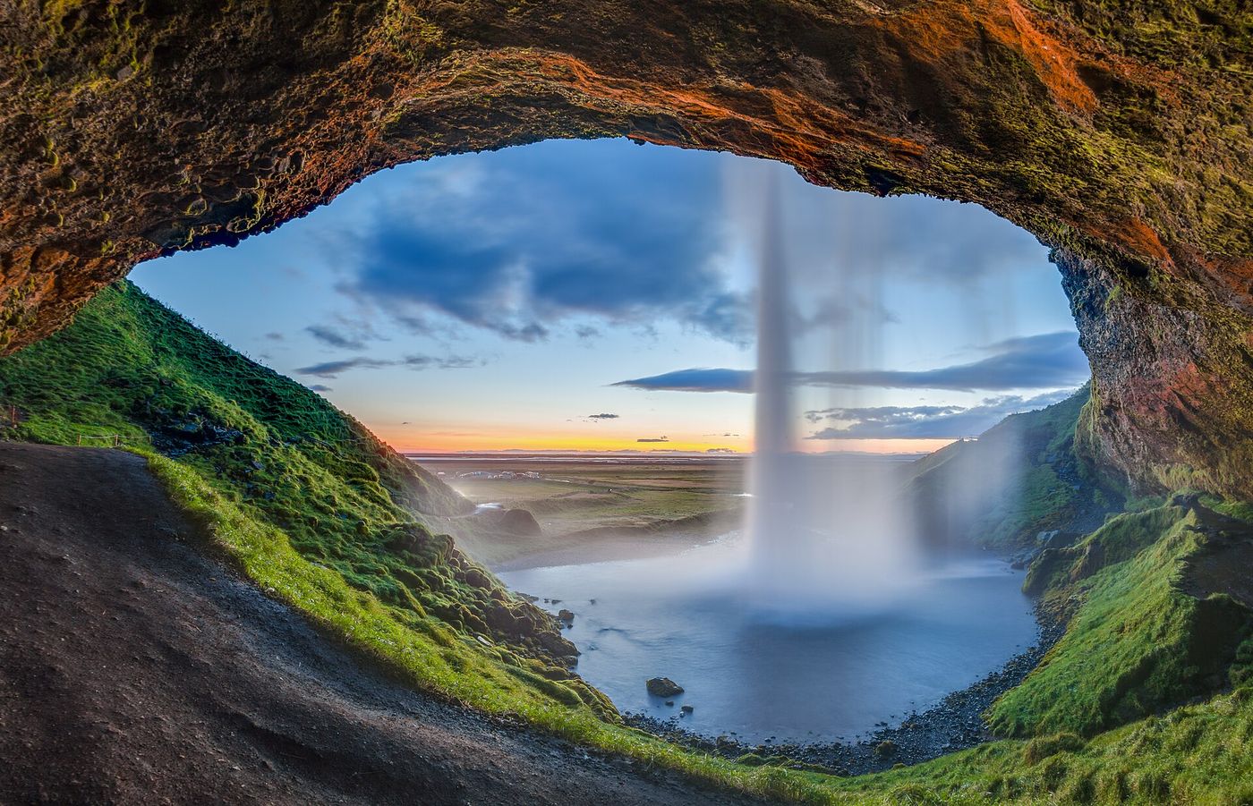 Seljalandsfoss seen from the path behind the falling water