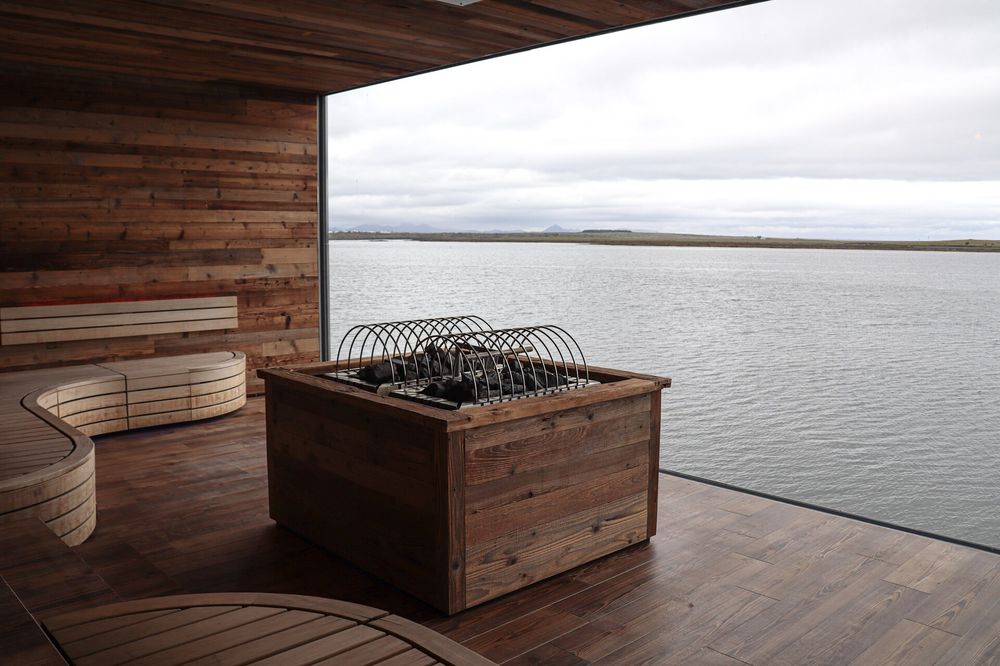 Inside Sky Lagoon's sauna, looking out over the Atlantic